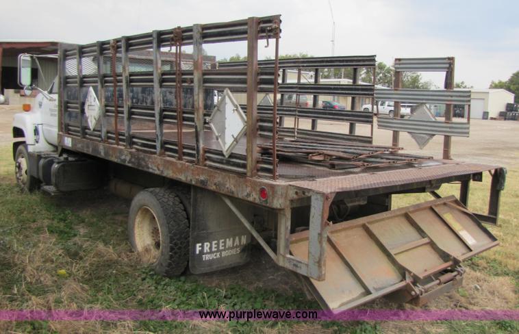 image for item 3468 1994 GMC 6000 Topkick truck with 14' flatbed