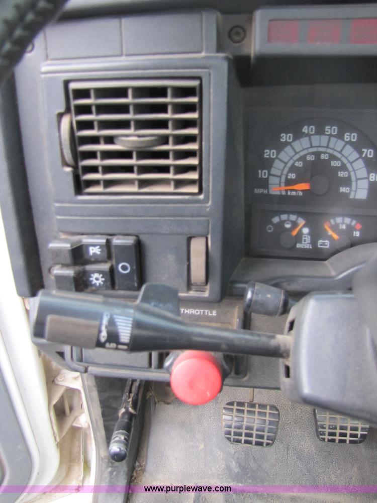 image for item 3468 1994 GMC 6000 Topkick truck with 14' flatbed