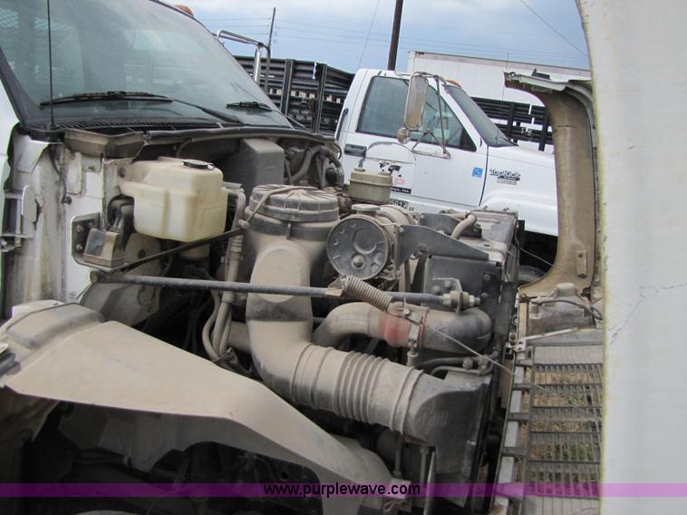 image for item 3468 1994 GMC 6000 Topkick truck with 14' flatbed