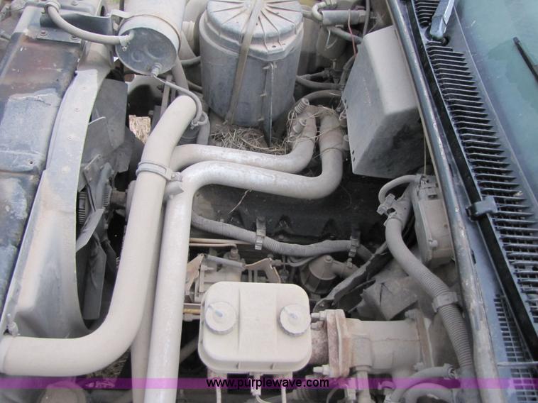 image for item 3468 1994 GMC 6000 Topkick truck with 14' flatbed