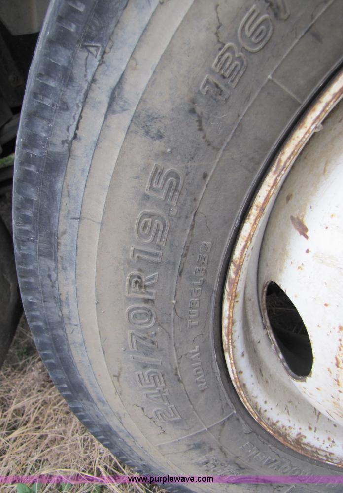 image for item 3468 1994 GMC 6000 Topkick truck with 14' flatbed