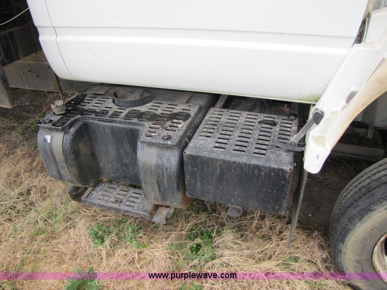 image for item 3468 1994 GMC 6000 Topkick truck with 14' flatbed