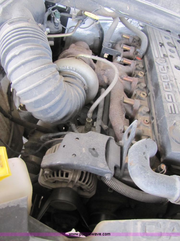 image for item 3469 2001 Dodge Ram 3500 flatbed truck