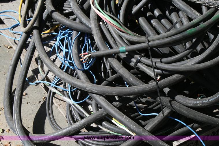 image for item 6467 (3) pallets assorted stranded three and four wire machine whips