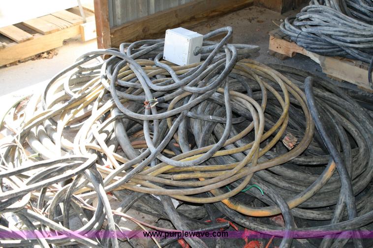 image for item 6467 (3) pallets assorted stranded three and four wire machine whips