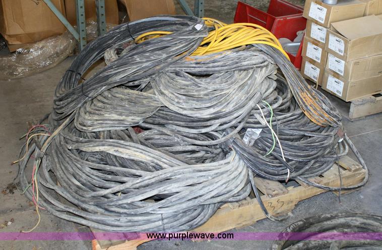 image for item 6467 (3) pallets assorted stranded three and four wire machine whips