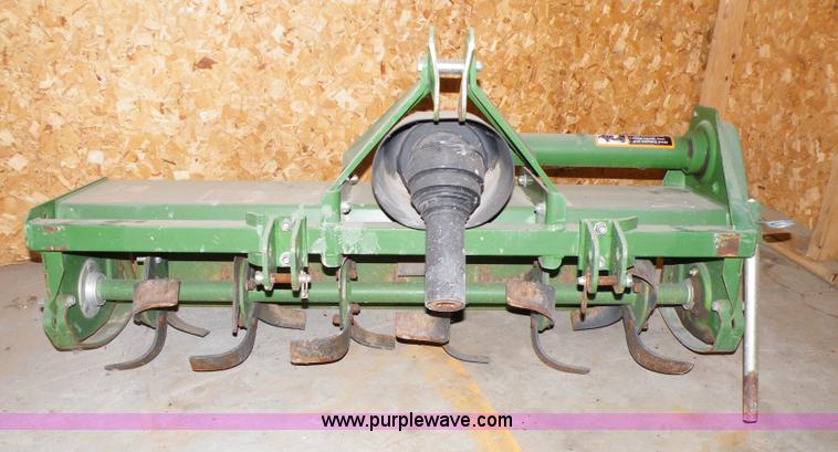 image for item 7302 John Deere 450 rotary tiller