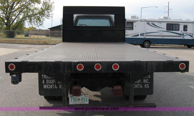 image for item 8051 1992 GMC Topkick LoPro SLE flatbed truck