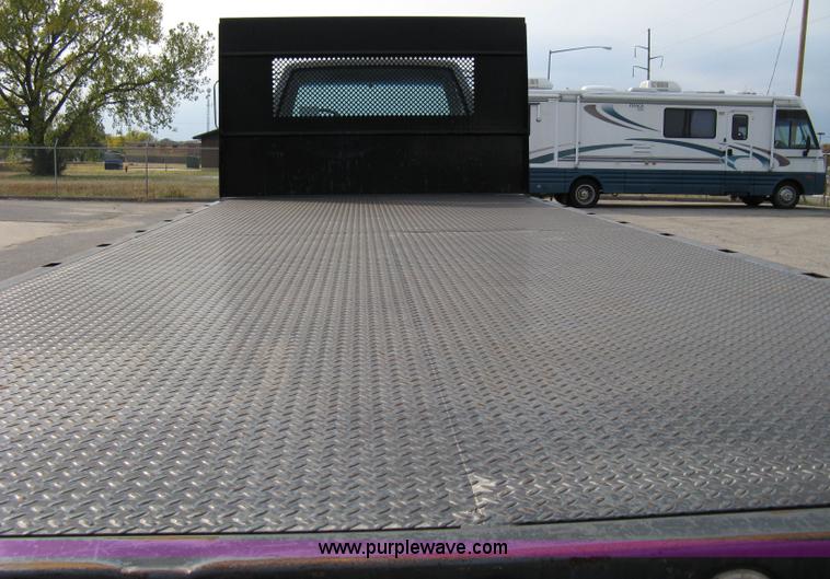 image for item 8051 1992 GMC Topkick LoPro SLE flatbed truck