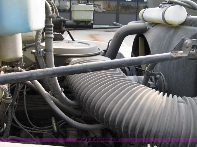 image for item 8051 1992 GMC Topkick LoPro SLE flatbed truck