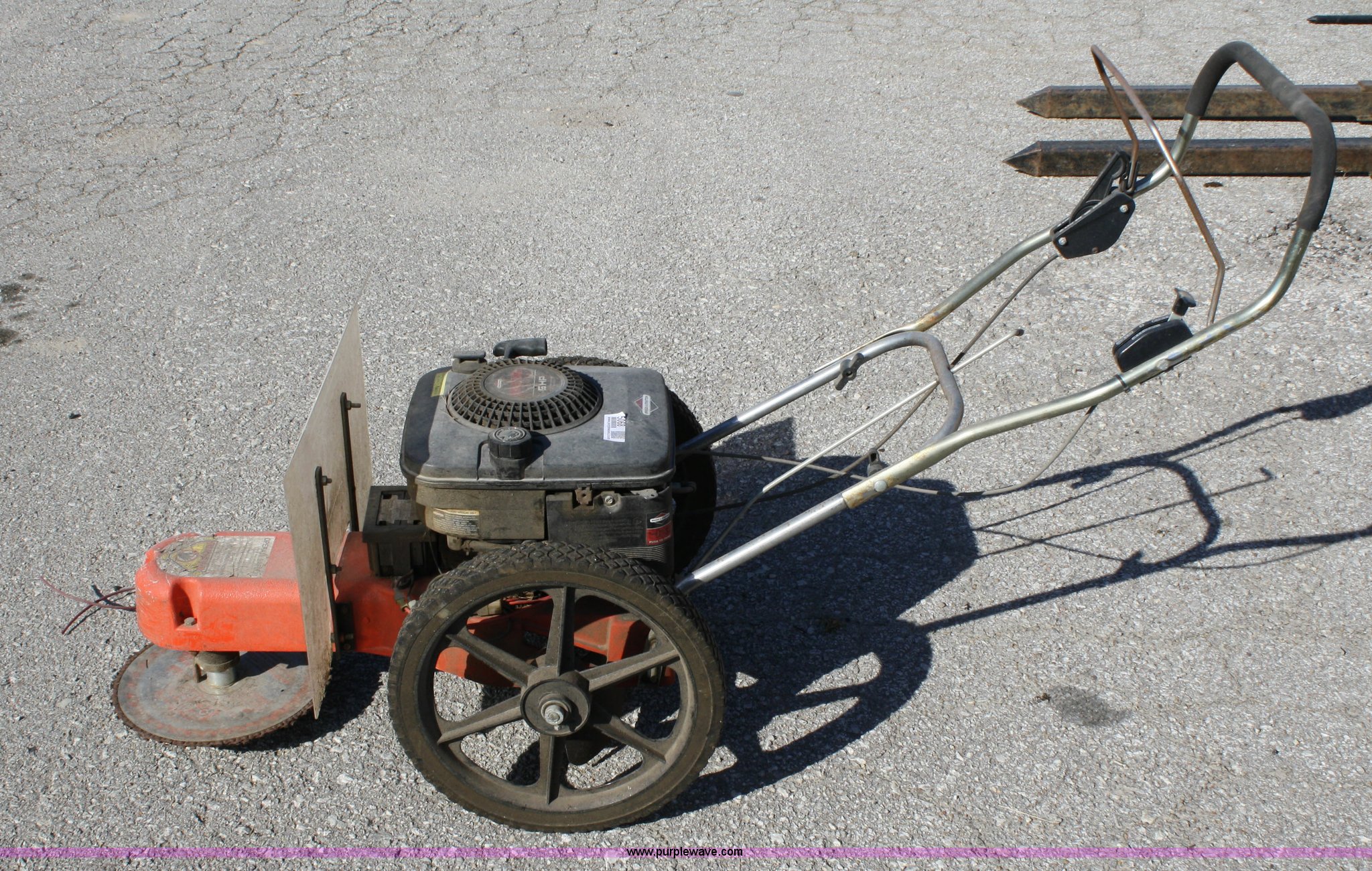 Walk behind weed eater in Lawrence, KS Item 5068 sold Purple Wave