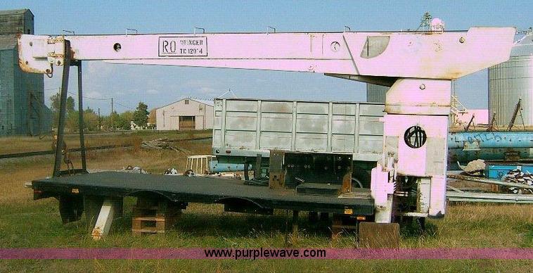 image for item 1863 RO TC120-4E boom hoist with bed