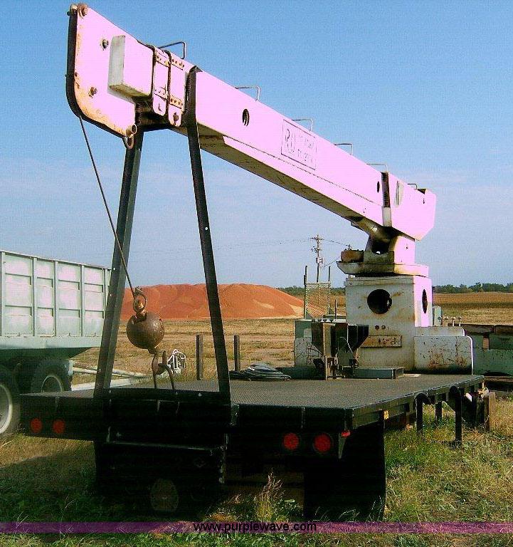image for item 1863 RO TC120-4E boom hoist with bed