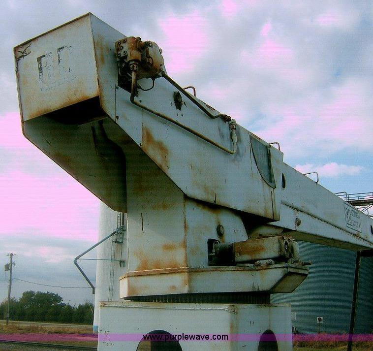 image for item 1863 RO TC120-4E boom hoist with bed