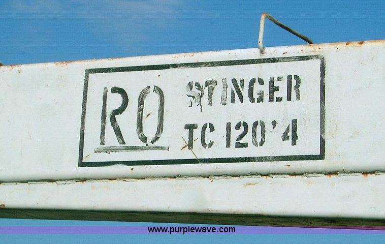 image for item 1863 RO TC120-4E boom hoist with bed