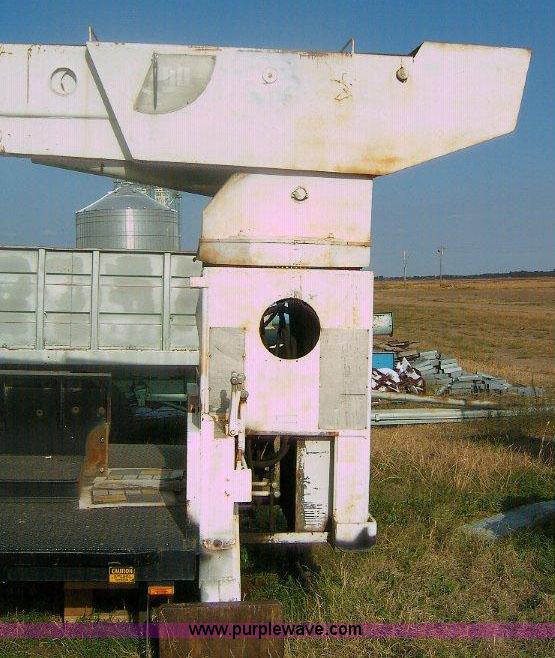 image for item 1863 RO TC120-4E boom hoist with bed