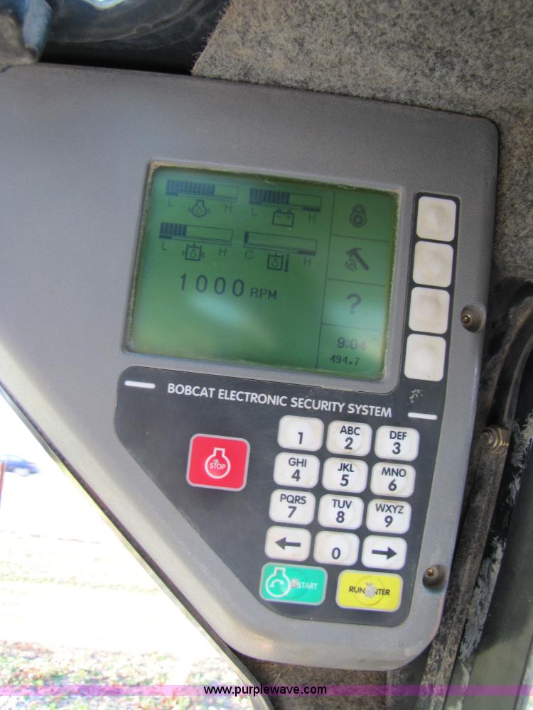 image for item 3537 2003 Bobcat T250 skid steer