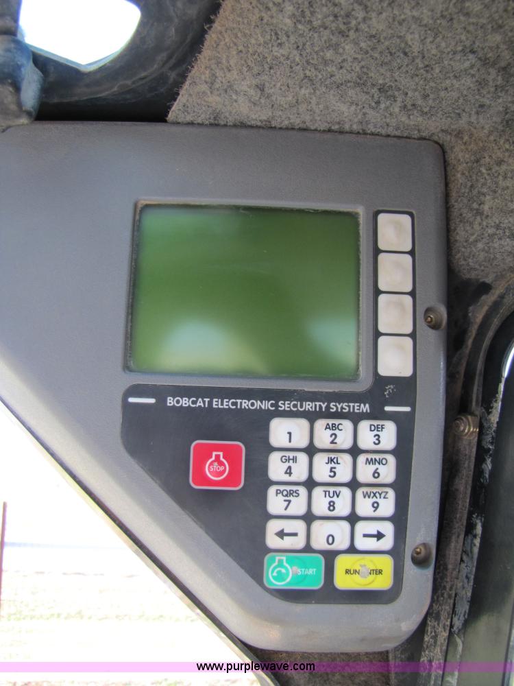 image for item 3537 2003 Bobcat T250 skid steer