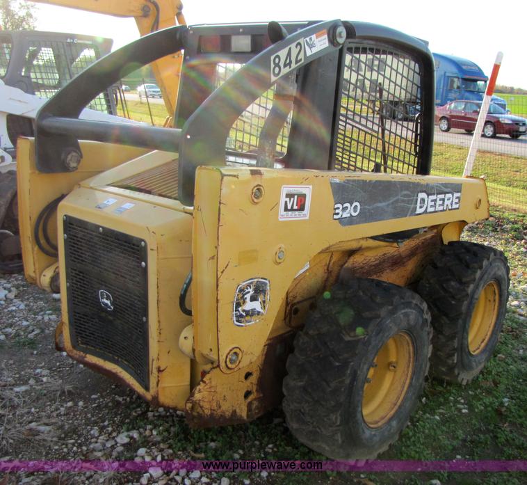image for item 3538 2005 John Deere 320 skid steer
