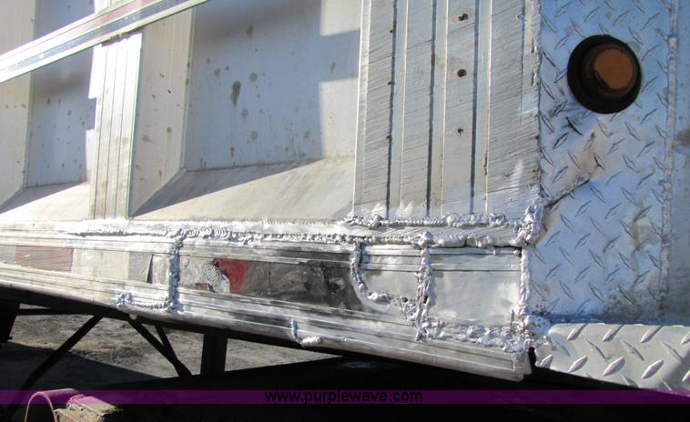 image for item 3593 1997 Travis 39' aluminum end dump trailer