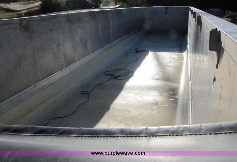 image for item 3593 1997 Travis 39' aluminum end dump trailer