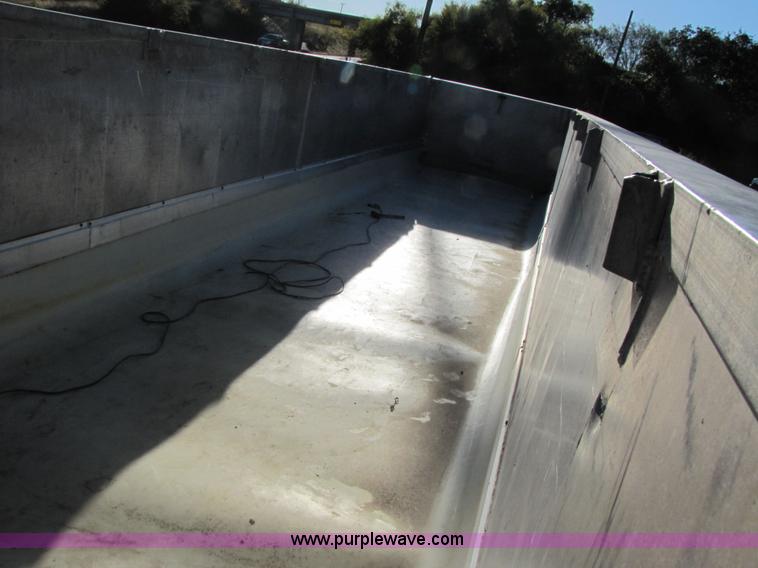 image for item 3593 1997 Travis 39' aluminum end dump trailer