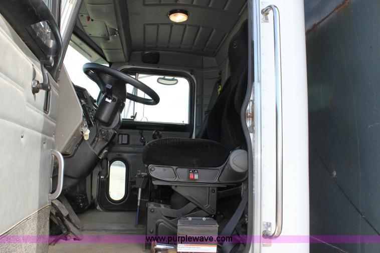 image for item 6195 2004 Peterbilt 330 tandem axle dump truck