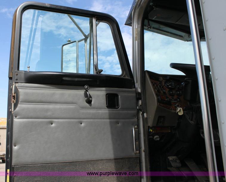 image for item 6195 2004 Peterbilt 330 tandem axle dump truck