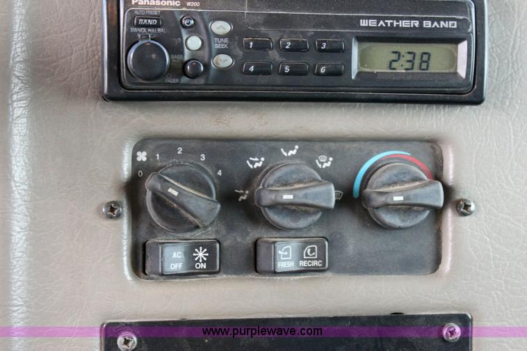 image for item 6195 2004 Peterbilt 330 tandem axle dump truck