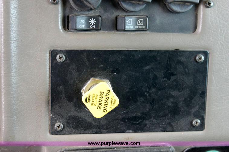 image for item 6195 2004 Peterbilt 330 tandem axle dump truck