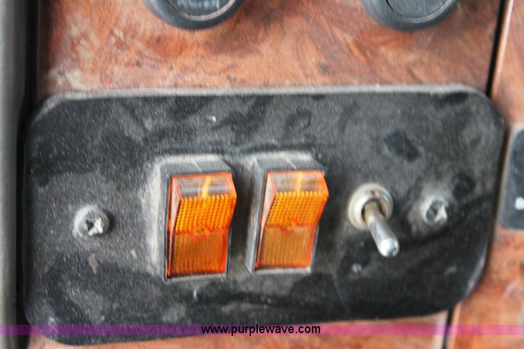 image for item 6195 2004 Peterbilt 330 tandem axle dump truck