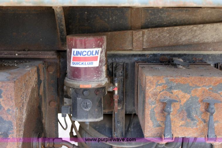 image for item 6195 2004 Peterbilt 330 tandem axle dump truck