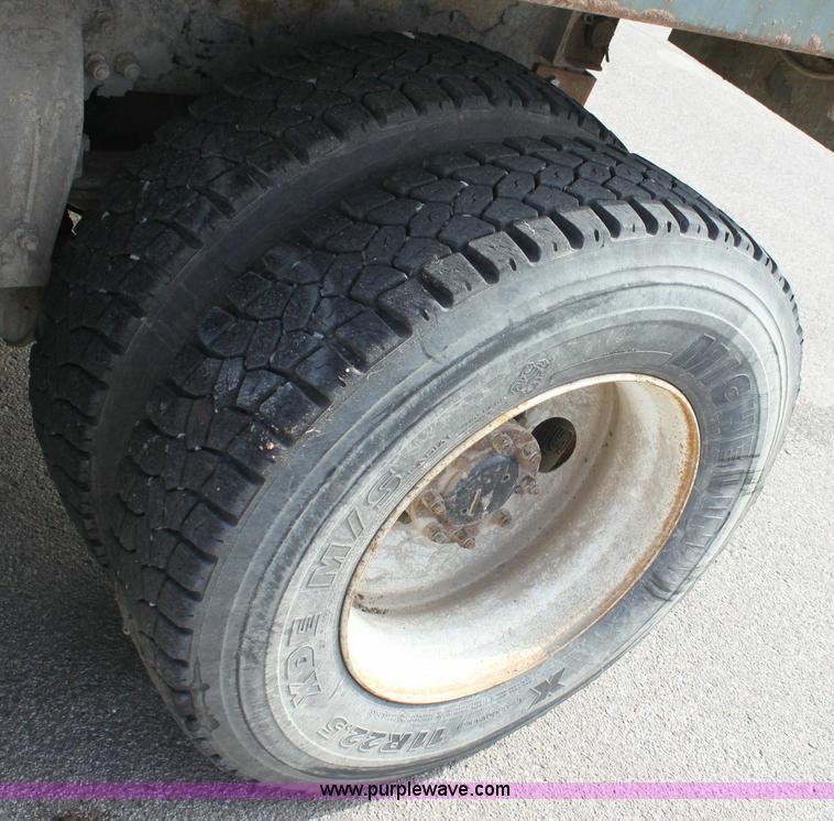 image for item 6195 2004 Peterbilt 330 tandem axle dump truck