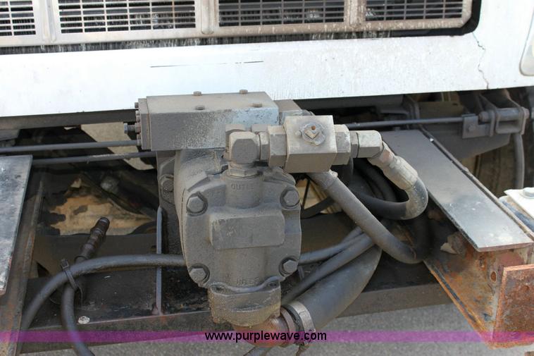 image for item 6195 2004 Peterbilt 330 tandem axle dump truck