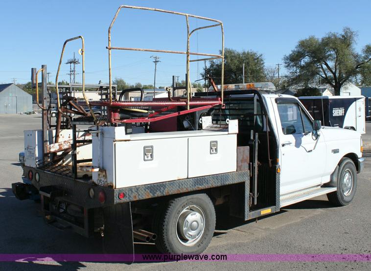 image for item 6258 1996 Ford F250 flat-bed pickup