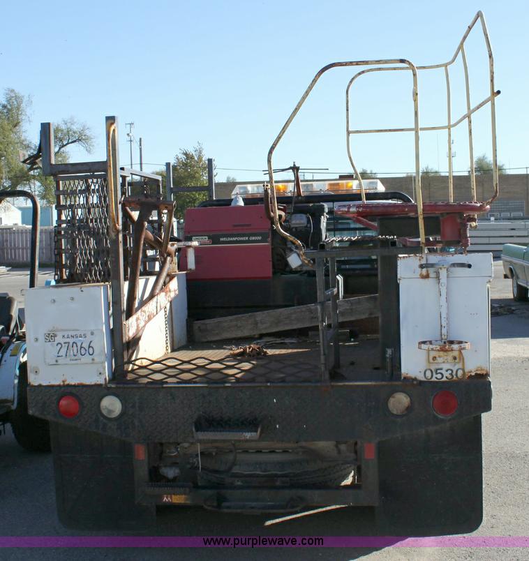 image for item 6258 1996 Ford F250 flat-bed pickup