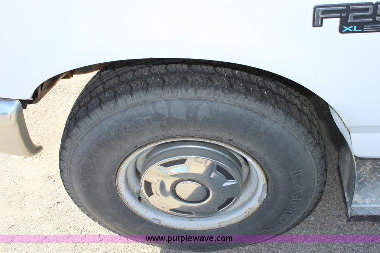 image for item 6258 1996 Ford F250 flat-bed pickup