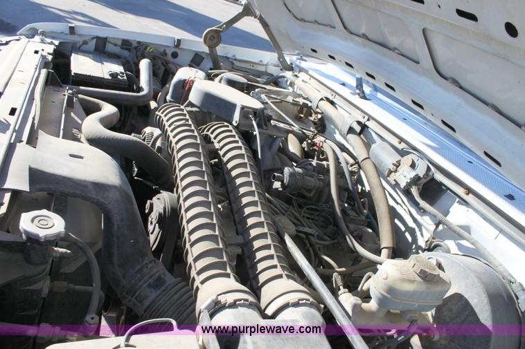 image for item 6258 1996 Ford F250 flat-bed pickup