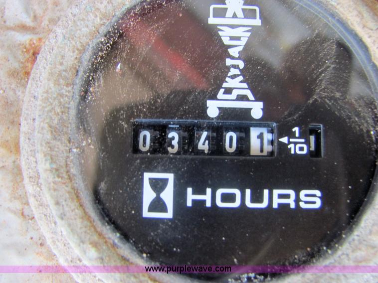 image for item 6564 2001 Skyjack SJIII 3226 scissor lift