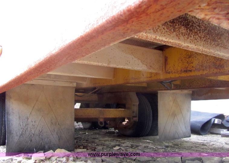 image for item 6666 1985 Eager Beaver 12TXT tilt-deck trailer