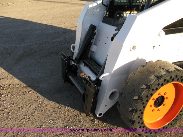 image for item 8048 Bobcat S250 skid steer
