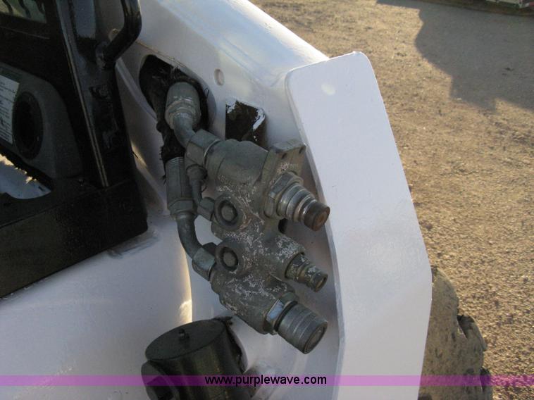 image for item 8048 Bobcat S250 skid steer