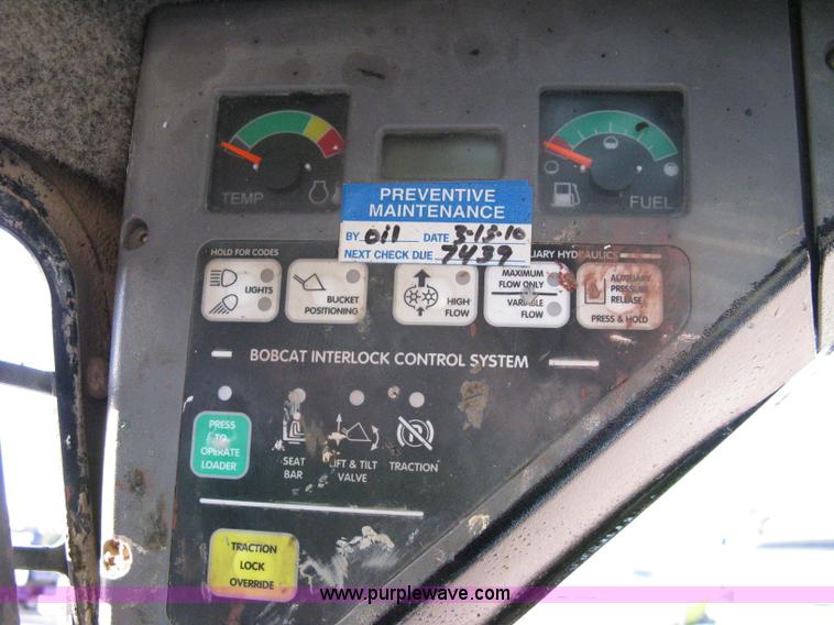 image for item 8048 Bobcat S250 skid steer