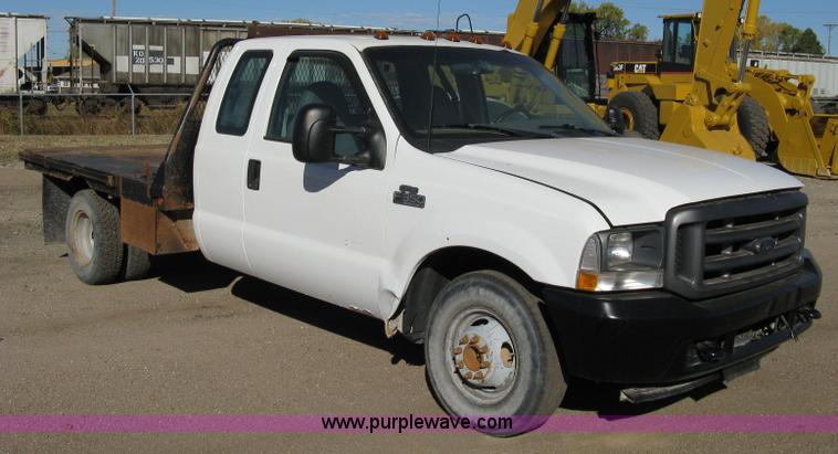 image for item 8052 2002 Ford F350 Super Duty extended cab pickup truck