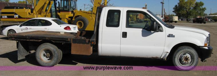 image for item 8052 2002 Ford F350 Super Duty extended cab pickup truck