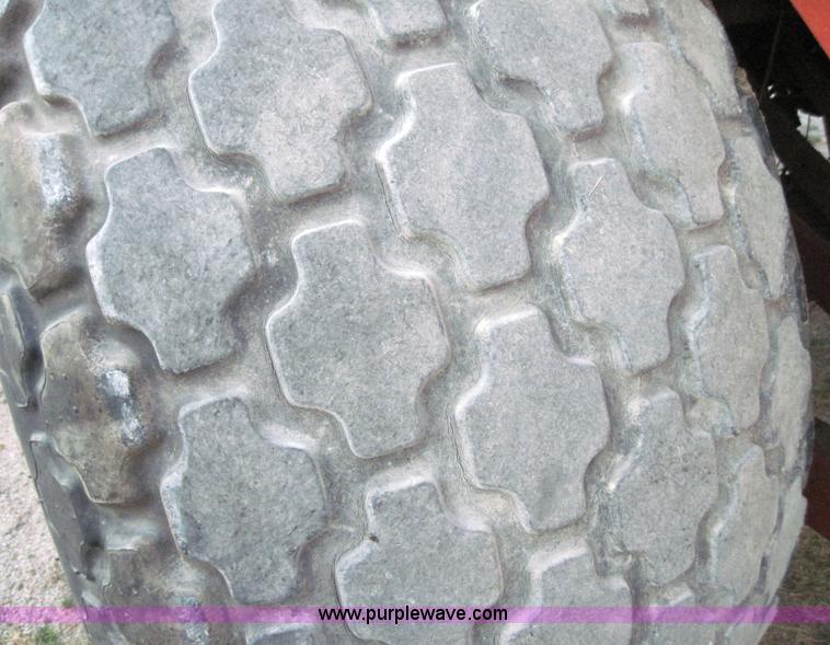 image for item 3021 Hesston 4900 4x4 square baler