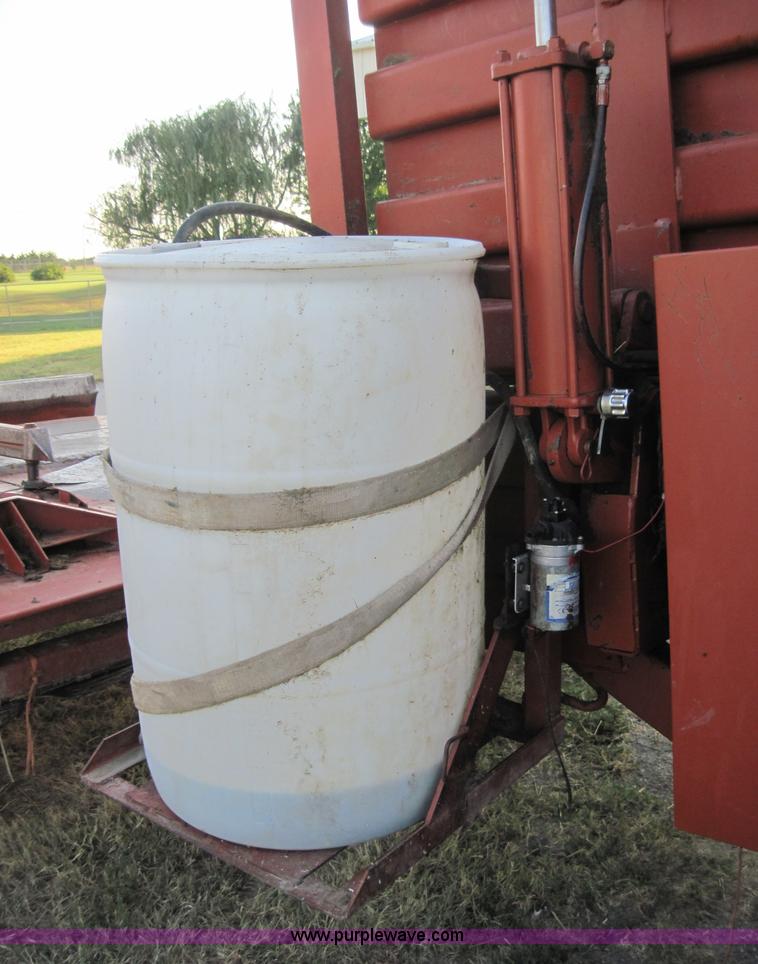 image for item 3021 Hesston 4900 4x4 square baler