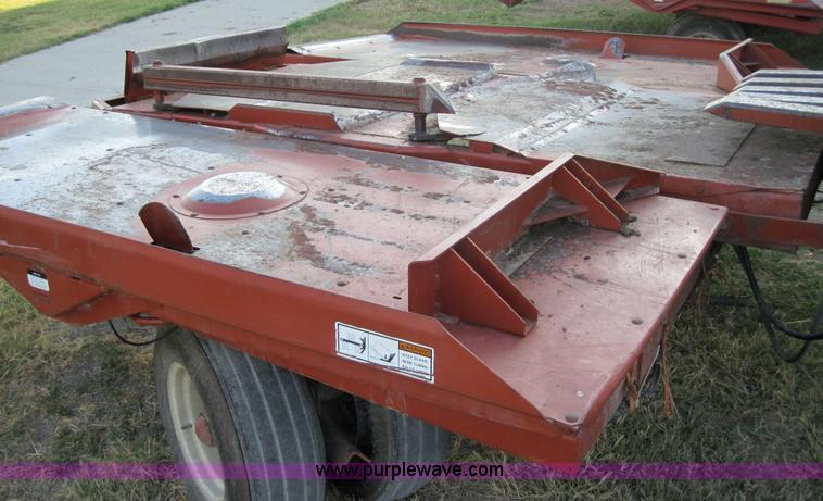 image for item 3021 Hesston 4900 4x4 square baler