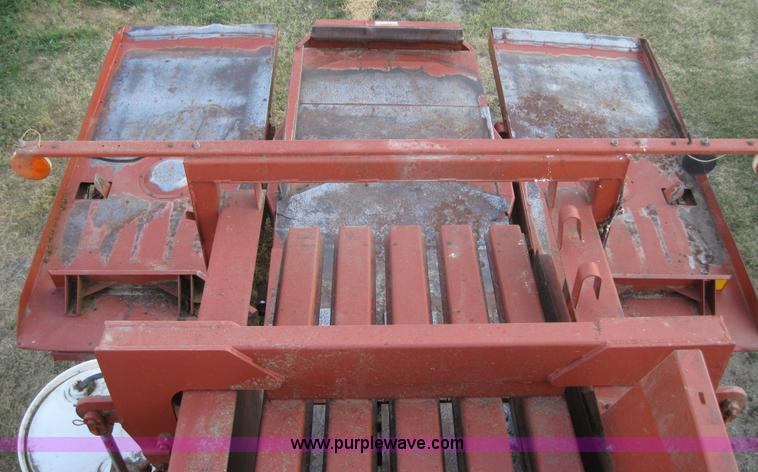 image for item 3021 Hesston 4900 4x4 square baler