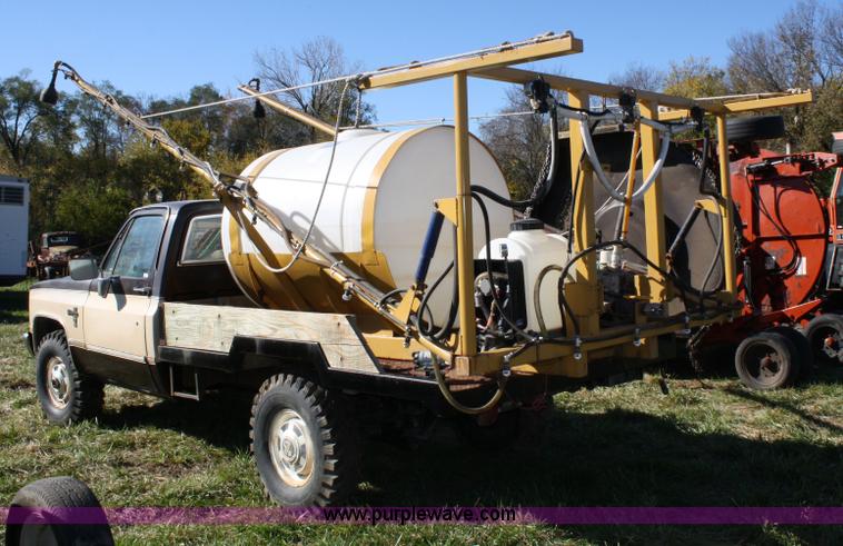 image for item 4650 1984 Chevrolet Silverado truck with spray rig